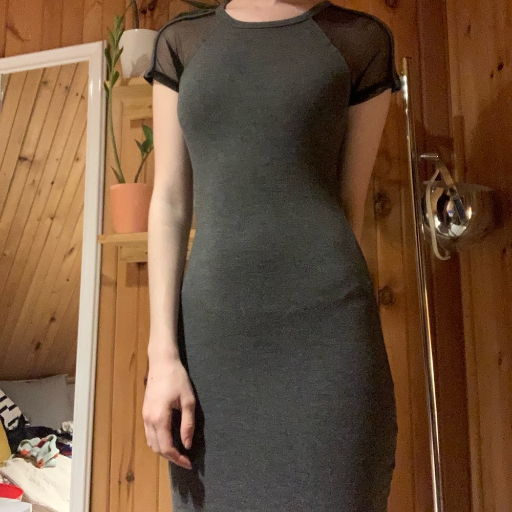 Beautiful garage dress with mesh sleeves